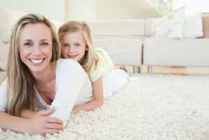 happy family faces on clean carpet Slidell LA